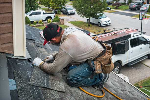 Professional Flat Roof Repair technician working in Carmel, IN